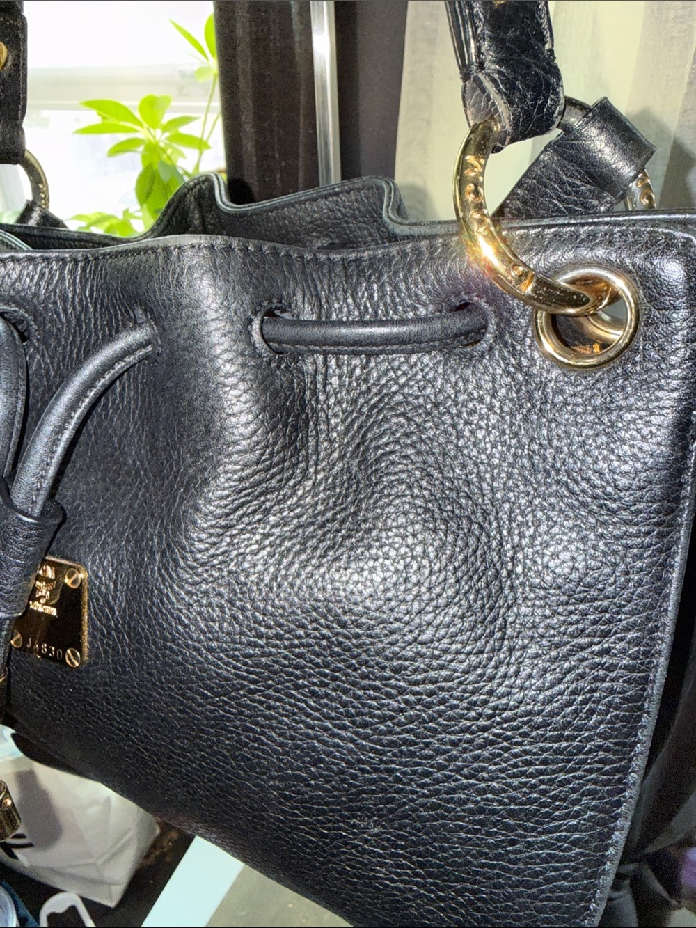 MCM Black Pebbled Leather Drawstring Shoulder Crossbody Bag with Gold Hardware - Picture 5 of 13
